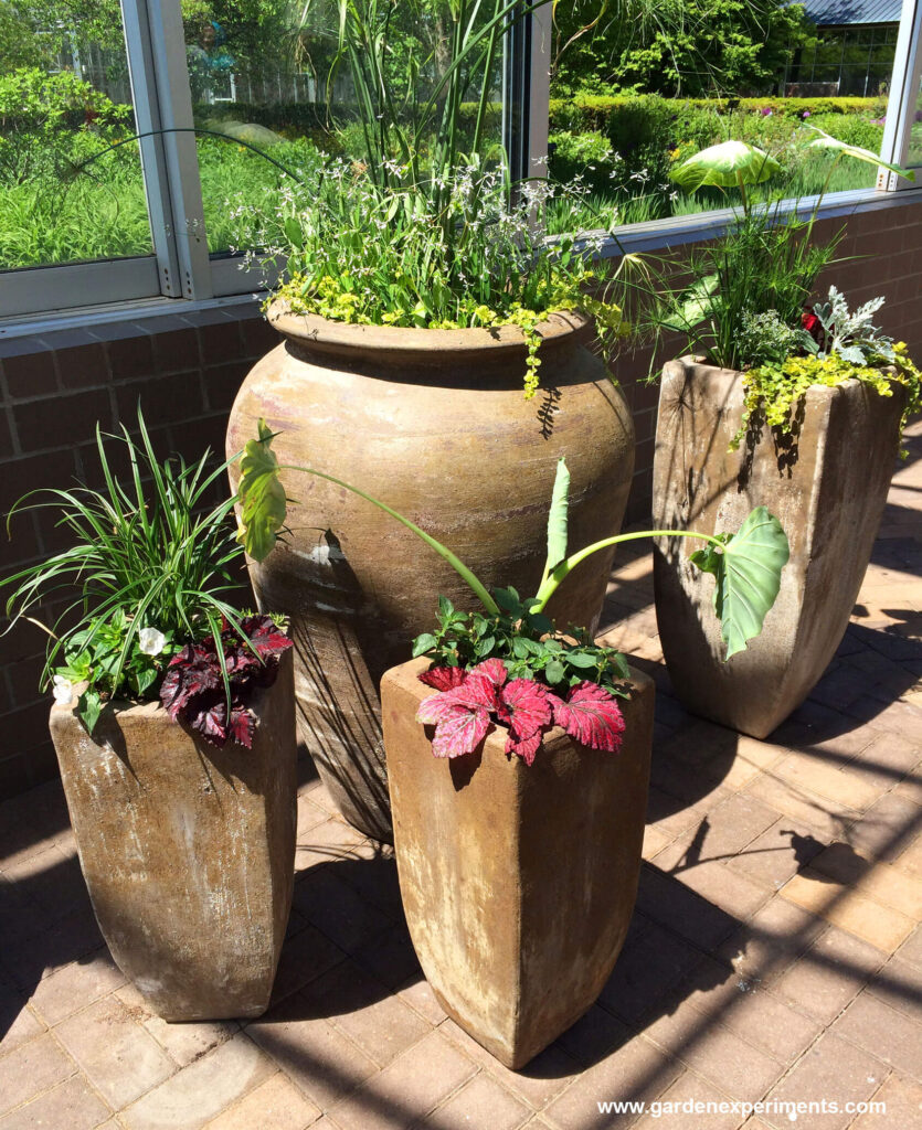 Tall planters at the entrance to the gardens